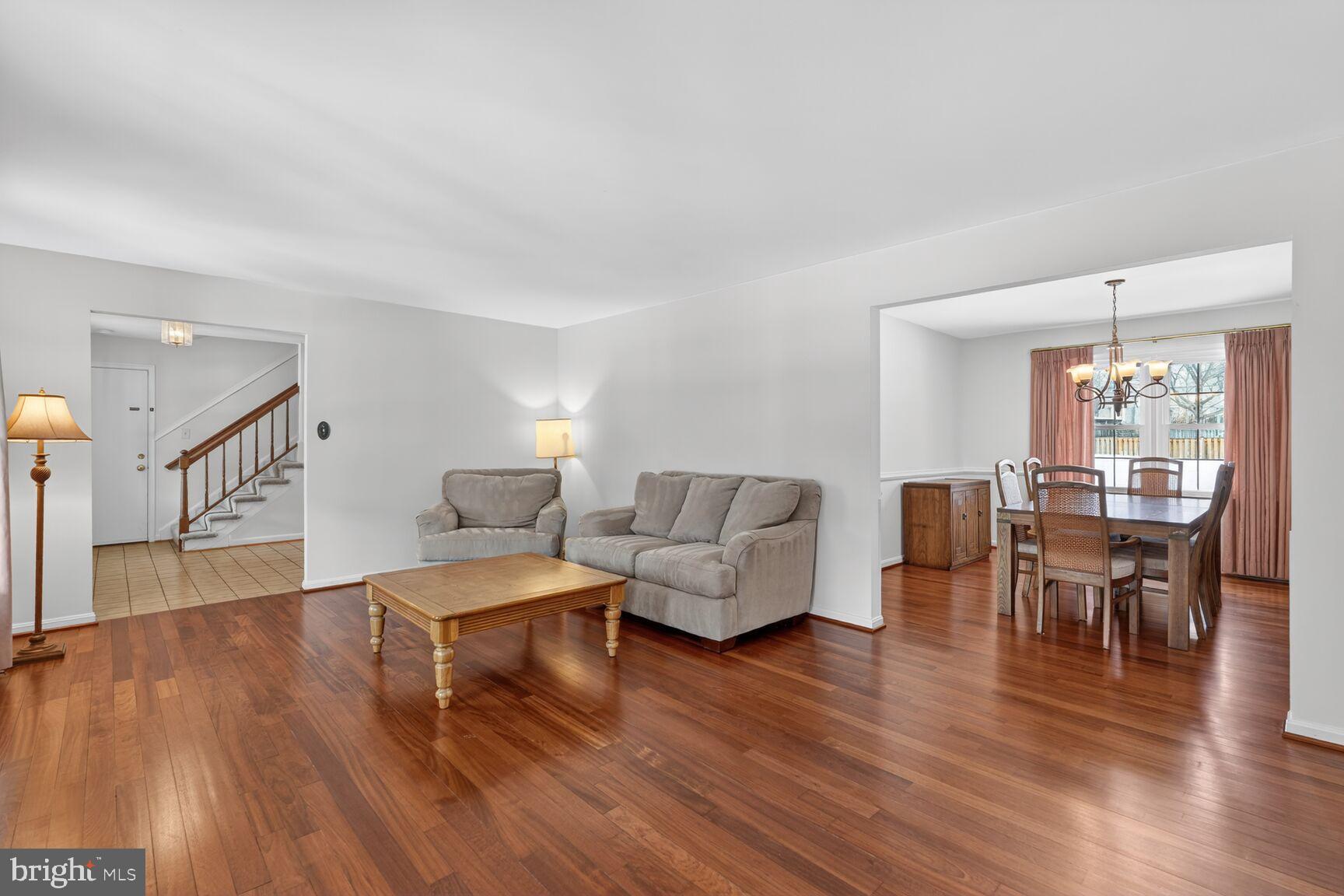 8836 Shadowlake Way Springfield, VA 22153 - Photo 28 of 77 Spacious living area with warm wood floors.