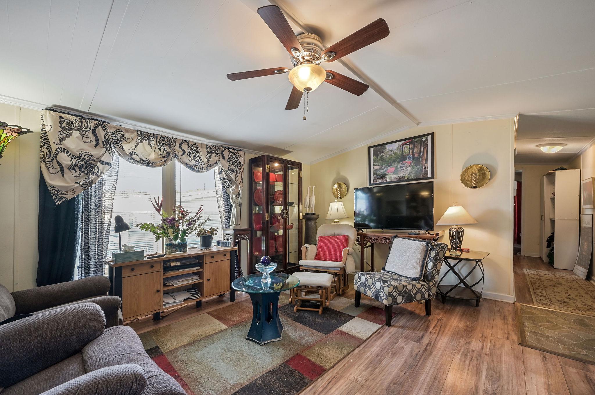 437 Ranee Loop, Unit 66 Bear, DE 19701 - Photo 8 of 20 a living room with furniture and a flat screen tv