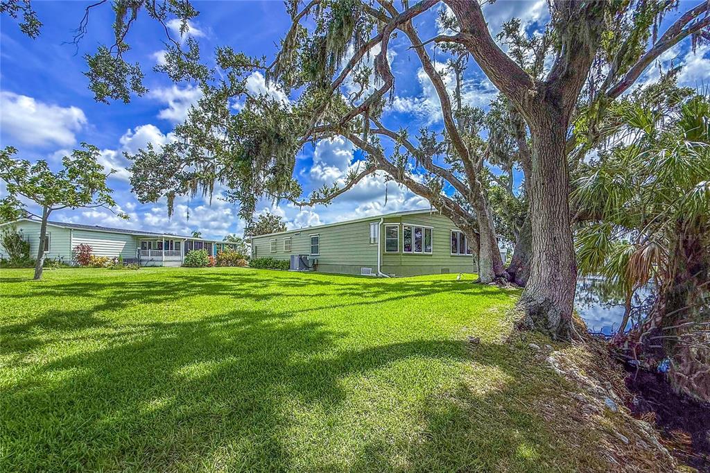 83 Eagle Circle Ellenton, FL 34222 - Photo 46 of 60 a front view of a house with a garden