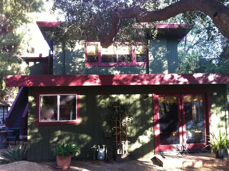 a view of street and flowers