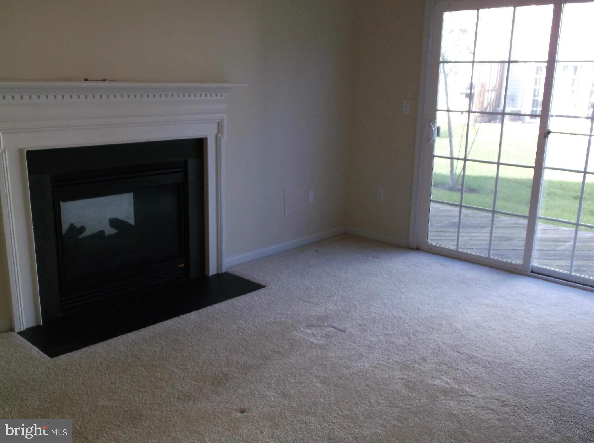 542 Summerset Court, Unit 39 Solomons, MD 20629 - Photo 21 of 39 a view of empty room with window