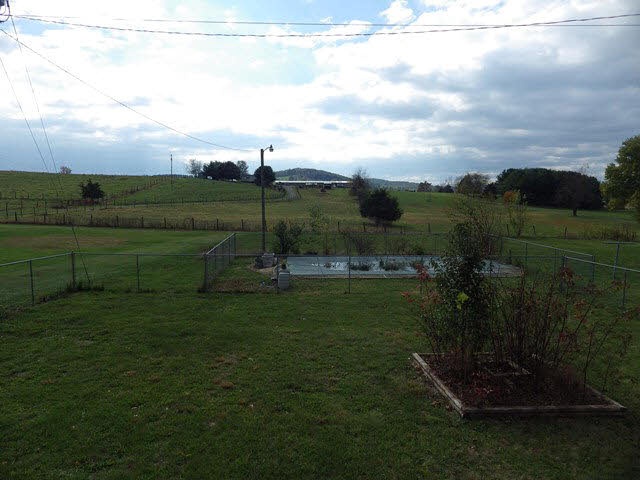 555 Madrid Road Waynesboro, VA 22980 - Photo 2 of 18 a view of a golf course with a garden
