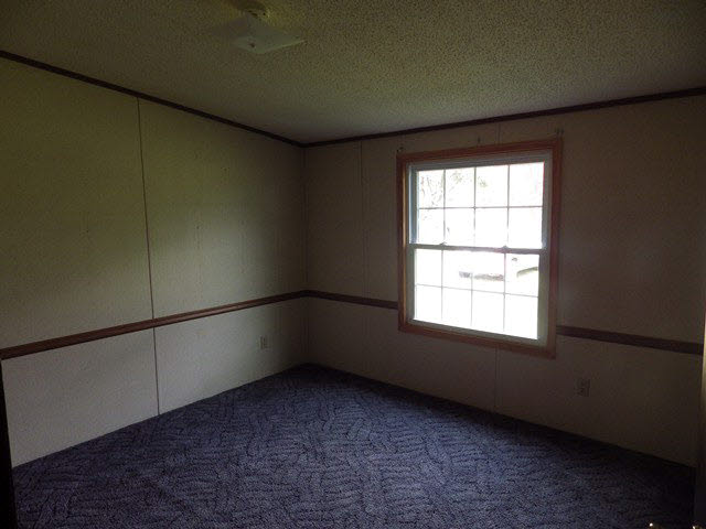 555 Madrid Road Waynesboro, VA 22980 - Photo 4 of 18 a view of an empty room with a window
