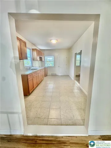 a view of a kitchen with kitchen