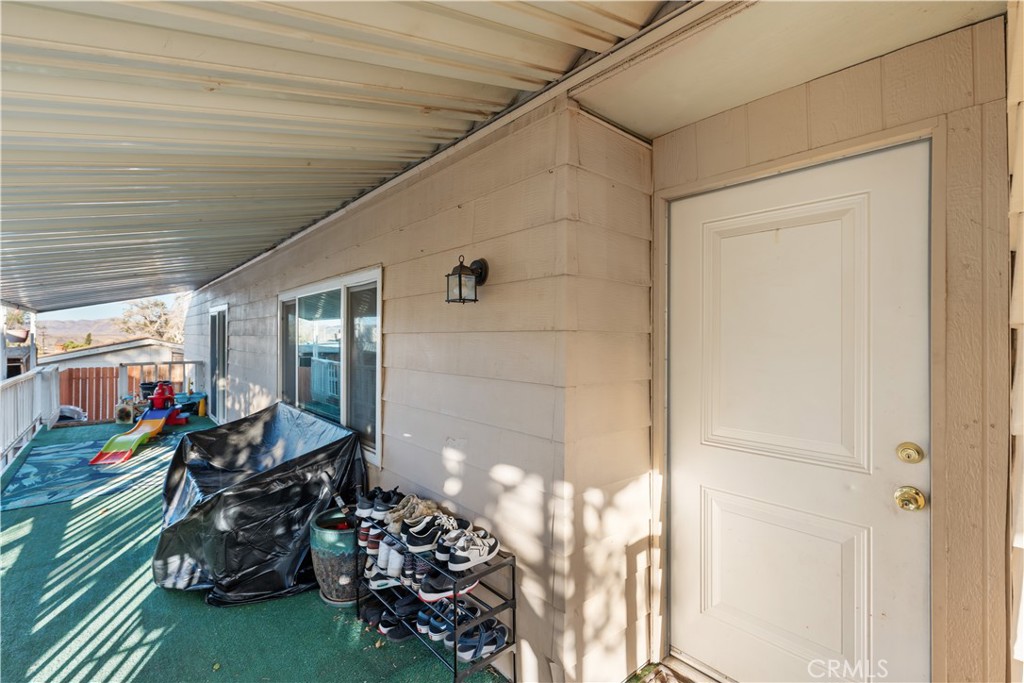 1000 Windy Pass, Unit 146 Barstow, CA 92311 - Photo 23 of 29 a living room filled with furniture