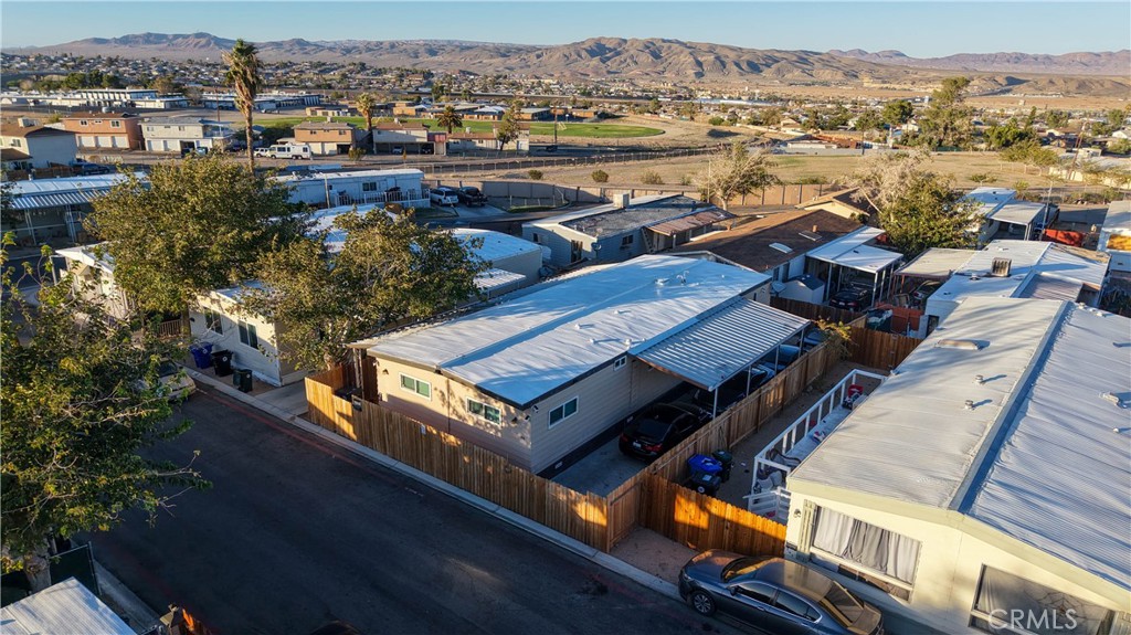 1000 Windy Pass, Unit 146 Barstow, CA 92311 - Photo 28 of 29 an aerial view of a residential building and lake view