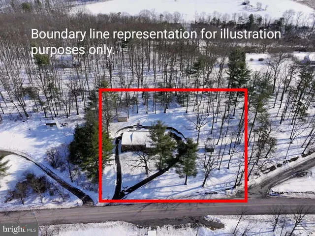 a bathroom with a sink a vanity and a window