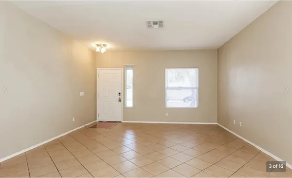 a view of an empty room with window