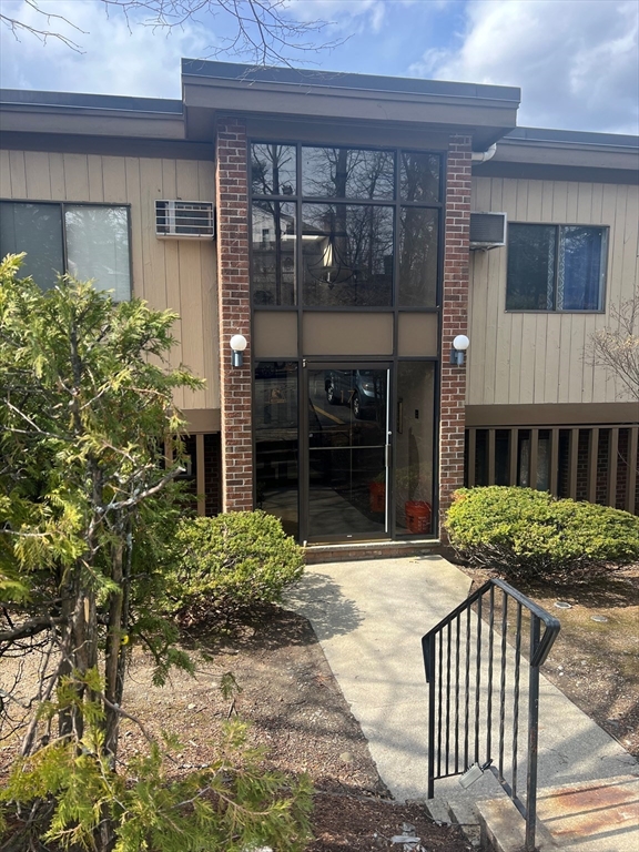 a front view of a house with balcony