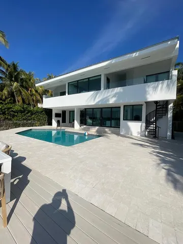 a view of a street with an ocean view
