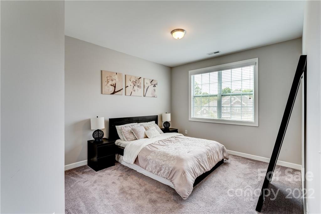 5409 Meadowcroft Way Fort Mill, SC 29708 - Photo 29 of 34 a bedroom with a bed and a window
