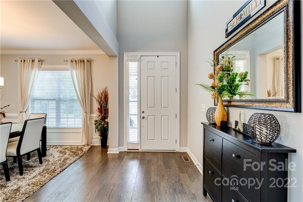 5409 Meadowcroft Way Fort Mill, SC 29708 - Photo 5 of 34 a view of front door with chair and wooden floor