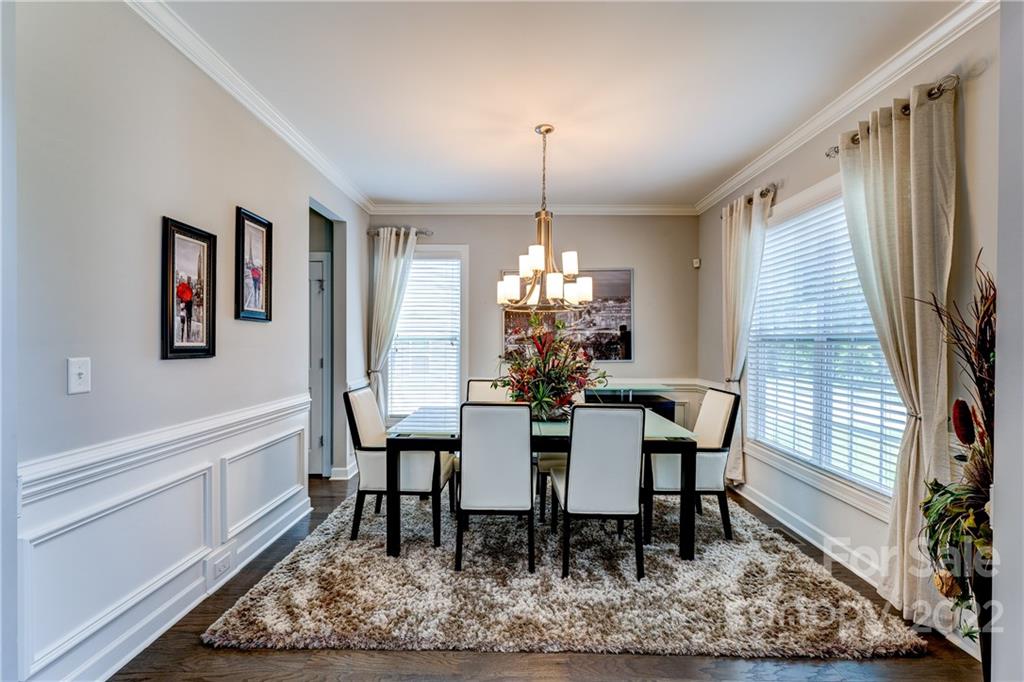 5409 Meadowcroft Way Fort Mill, SC 29708 - Photo 6 of 34 a view of a dining room with furniture window and wooden floor