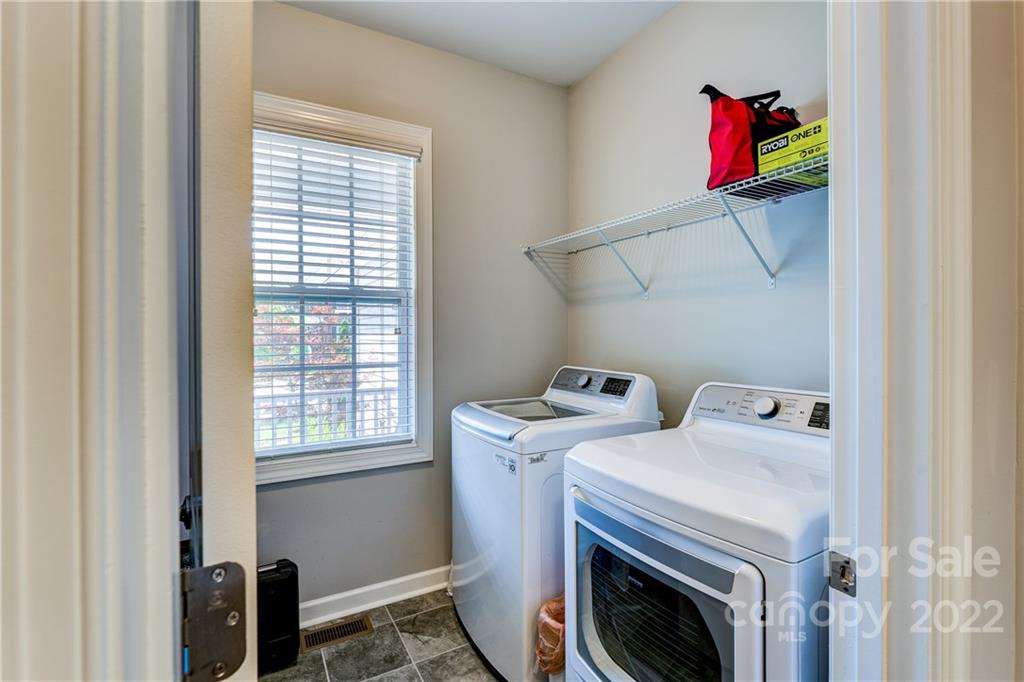5409 Meadowcroft Way Fort Mill, SC 29708 - Photo 9 of 34 a utility room with dryer and washer