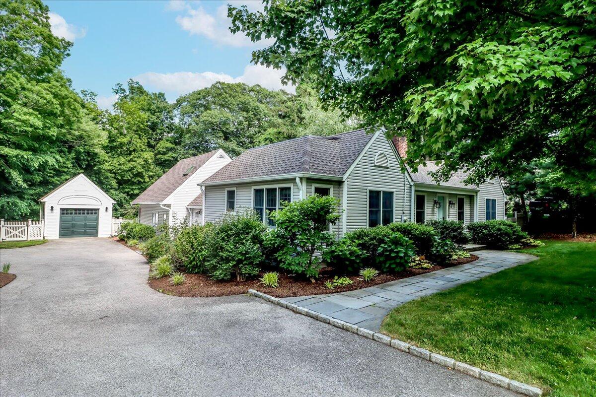 front view of a house with a yard