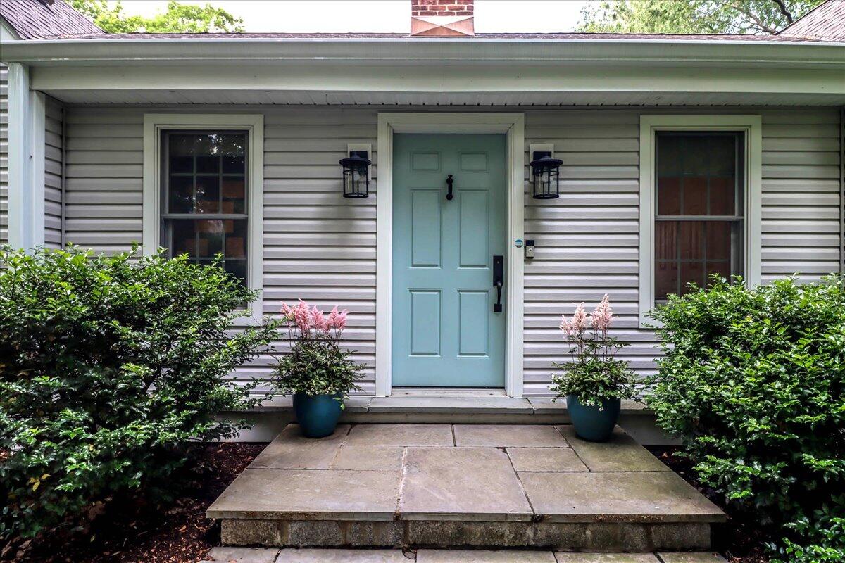 262 White Oak Shade Road New Canaan, CT 06840 - Photo 5 of 37 a view of a house with potted plants