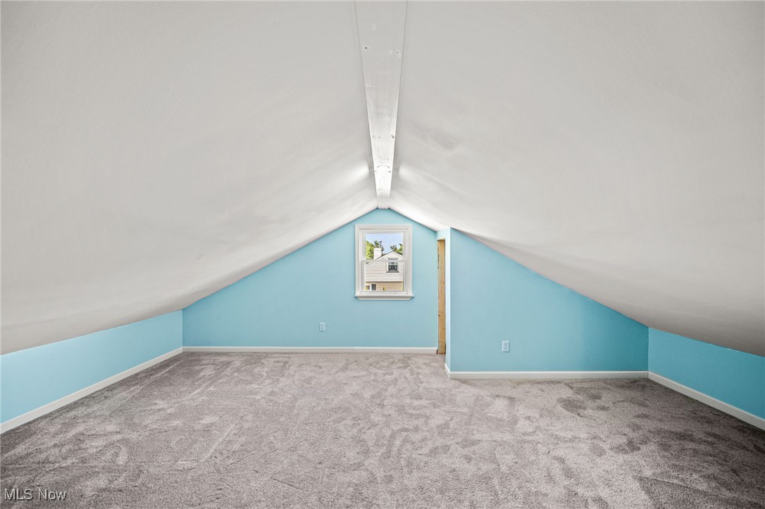 2716 Russell Road Ashtabula, OH 44004 - Photo 27 of 43 Additional living space featuring carpet and vaulted ceiling