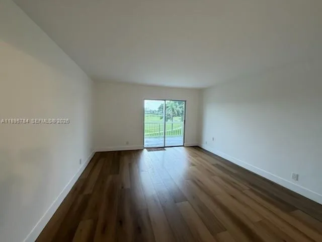 $335,000 | 250 John F Kennedy Drive, Unit 303, Atlantis, FL 33462