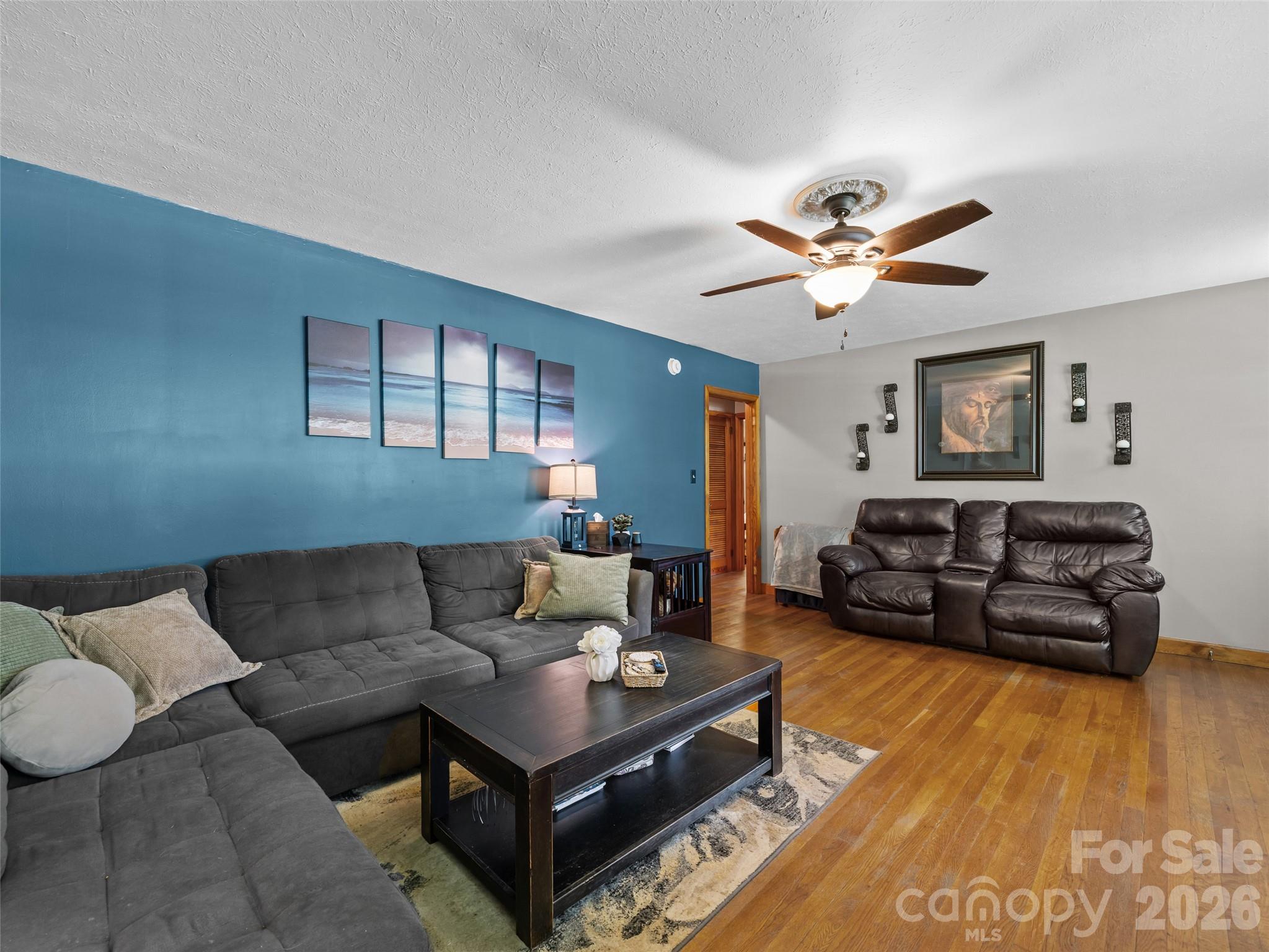 50 Baldwin Road Arden, NC 28704 - Photo 10 of 24 a living room with furniture and a wooden floor