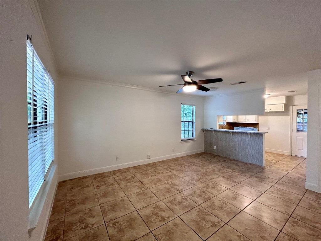 6200 Palm Circle Austin, TX 78741 - Photo 3 of 18 a view of a kitchen with a sink and a window