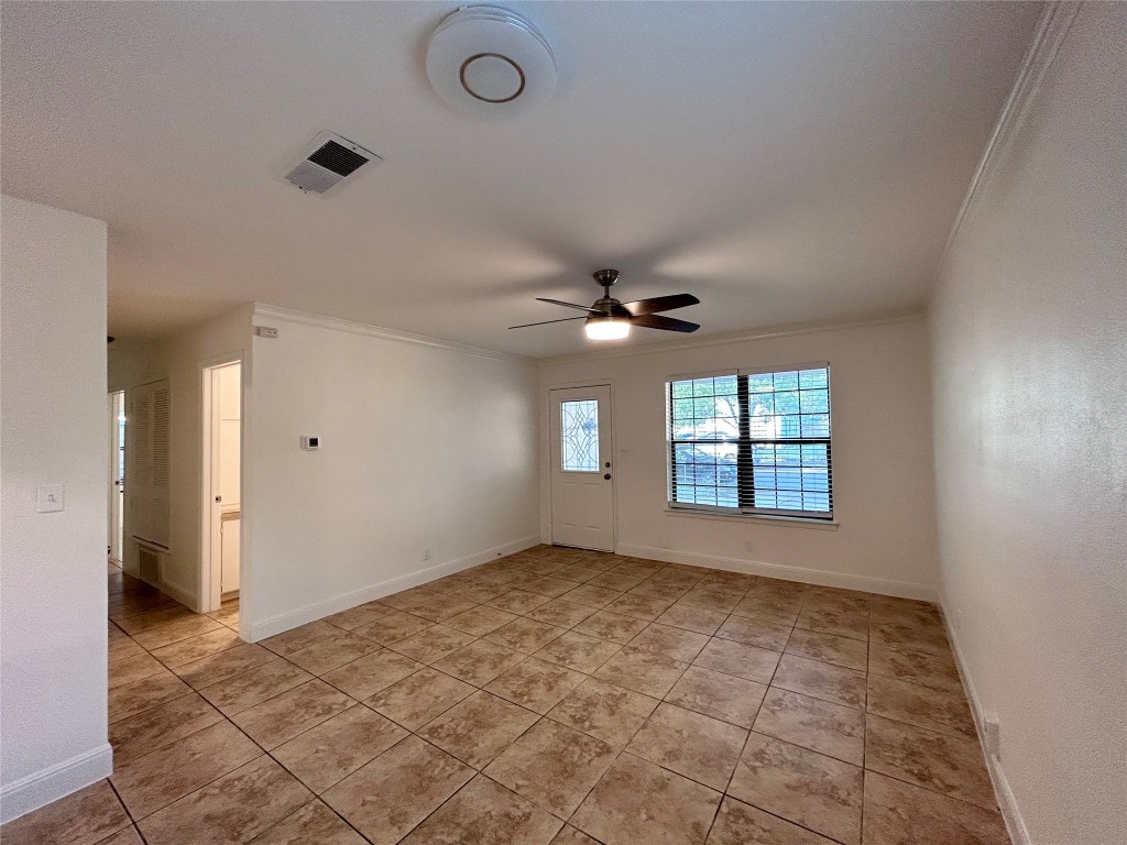 6200 Palm Circle Austin, TX 78741 - Photo 4 of 18 a view of an empty room with a window