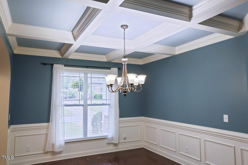 337 Shadowdale Lane Rolesville, NC 27571 - Photo 15 of 74 a view of a chandelier fan and wooden floor