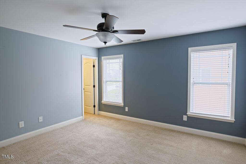 337 Shadowdale Lane Rolesville, NC 27571 - Photo 32 of 74 a view of an empty room with a window