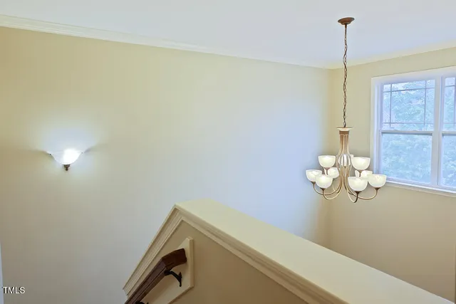 a view of a balcony with wooden floor