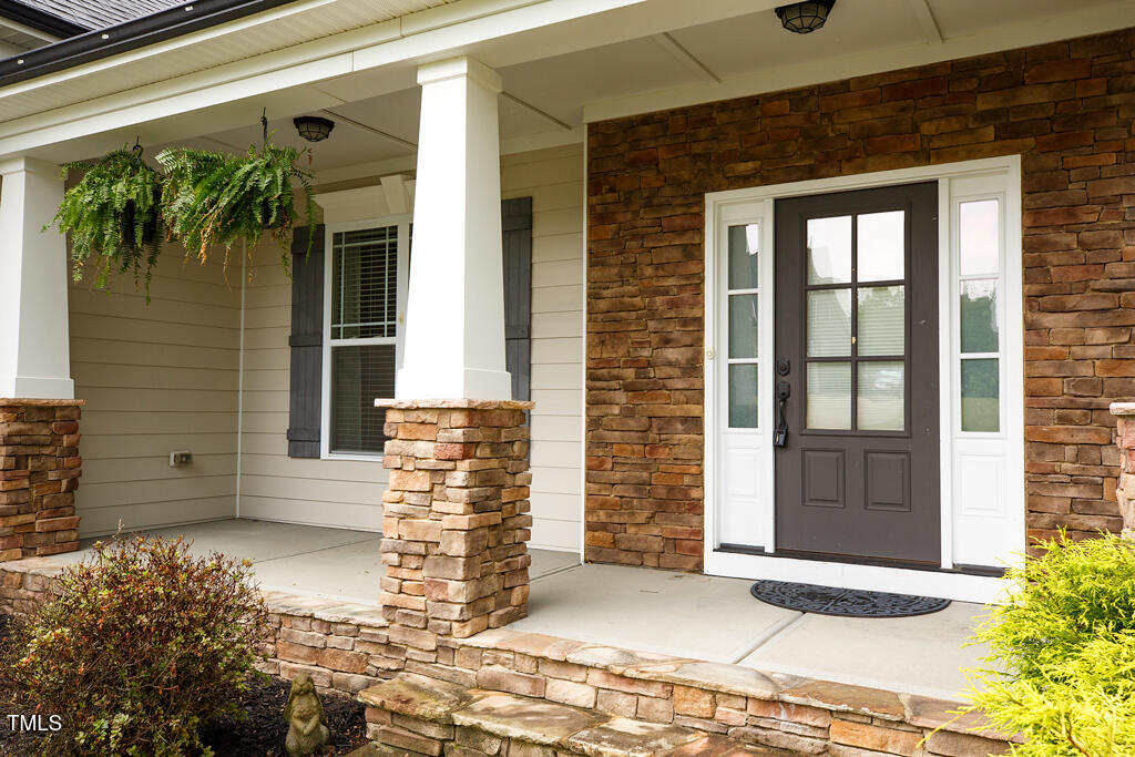 337 Shadowdale Lane Rolesville, NC 27571 - Photo 44 of 74 a front view of a house with a garage