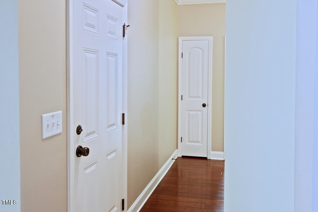 337 Shadowdale Lane Rolesville, NC 27571 - Photo 52 of 74 a view of a hallway with wooden floor