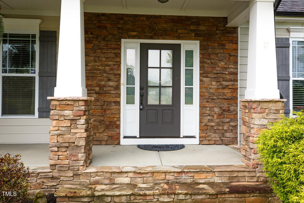 337 Shadowdale Lane Rolesville, NC 27571 - Photo 60 of 74 a front view of a house with a yard