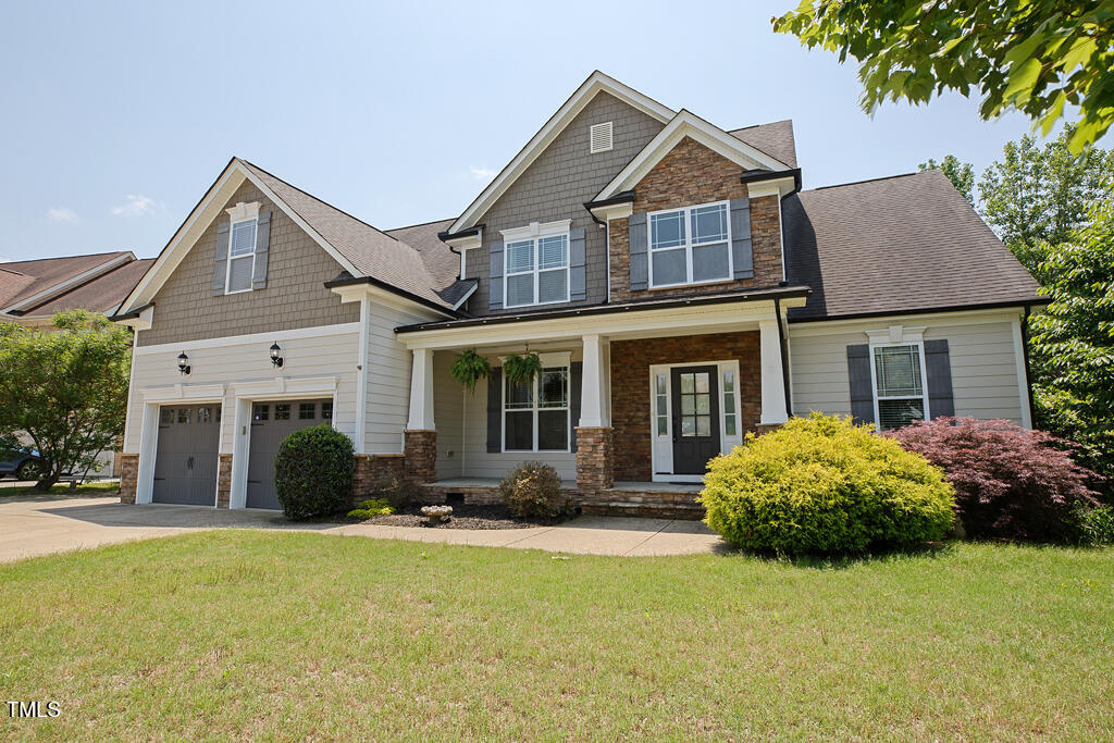337 Shadowdale Lane Rolesville, NC 27571 - Photo 64 of 74 a front view of a house with a yard
