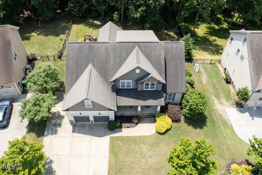 337 Shadowdale Lane Rolesville, NC 27571 - Photo 72 of 74 an aerial view of a house with swimming pool and garden