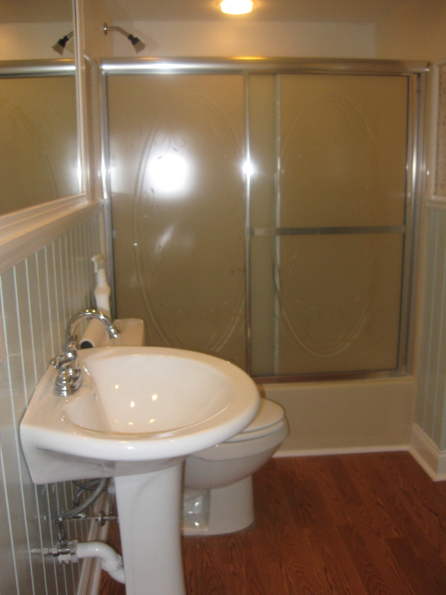 9 Joseph Street Darien, CT 06820 - Photo 12 of 18 a bathroom with a sink and mirror