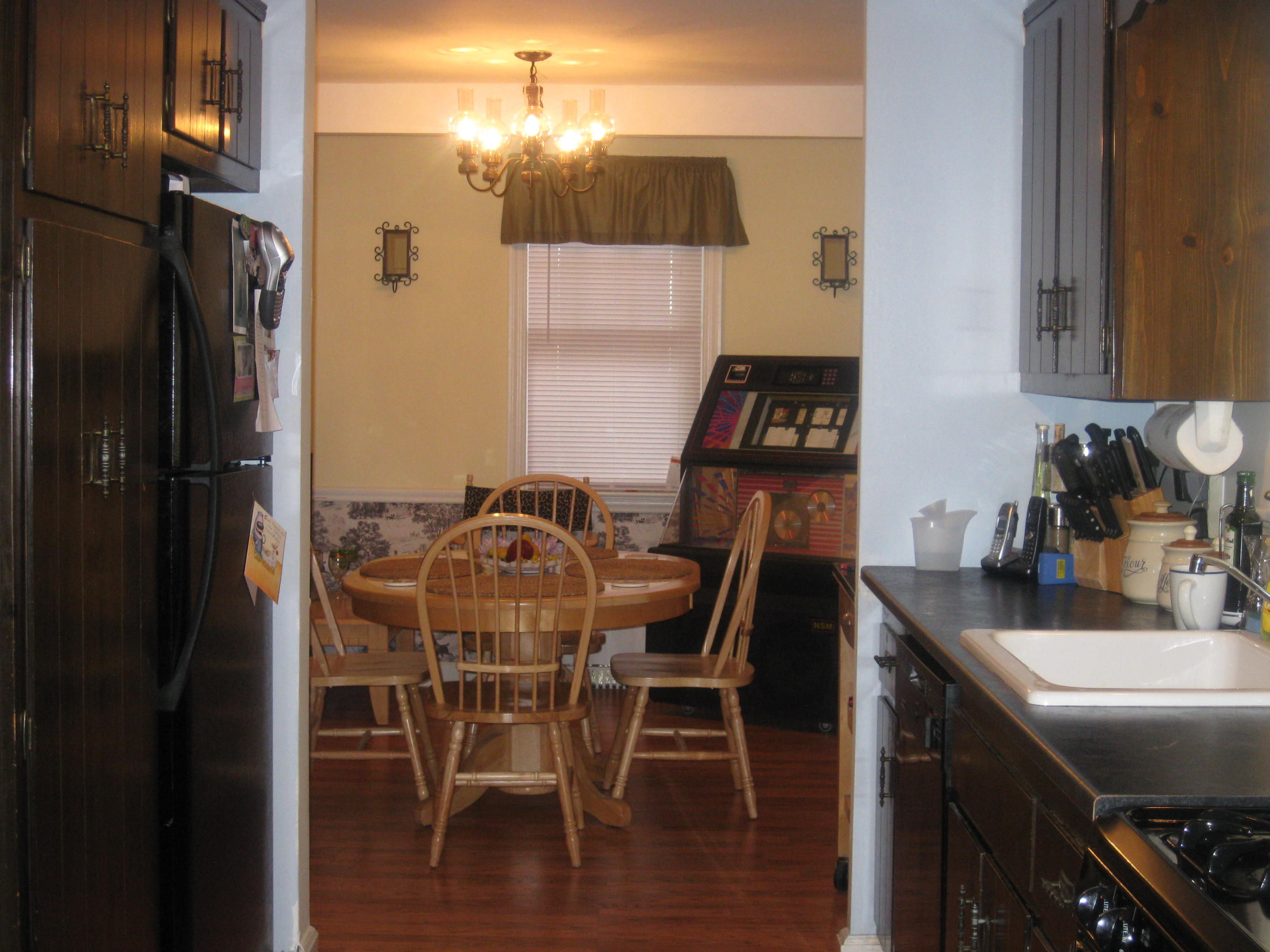 9 Joseph Street Darien, CT 06820 - Photo 15 of 18 a dining room with furniture and wooden floor