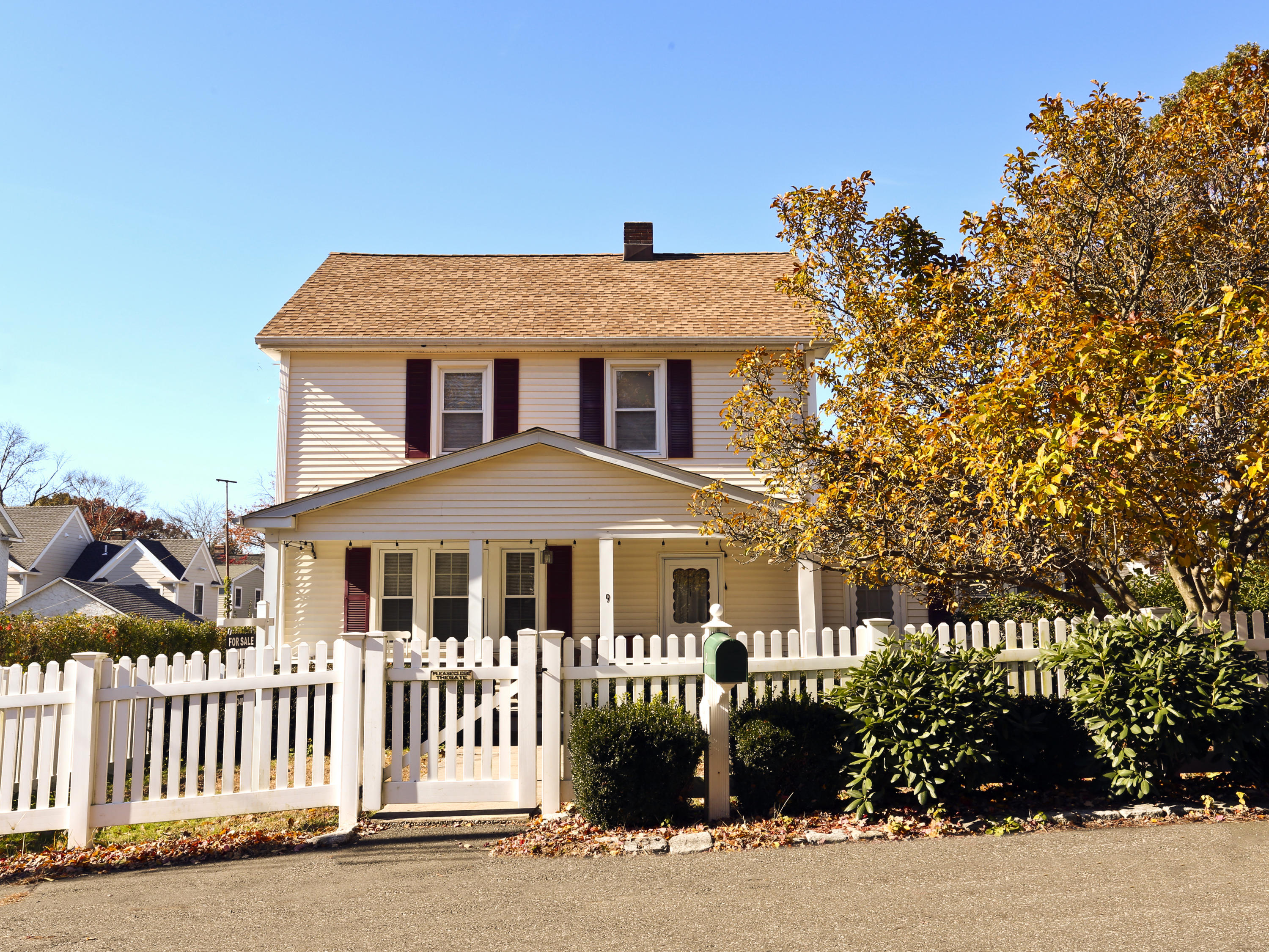9 Joseph Street Darien, CT 06820 - Photo 3 of 18 a front view of a house with a yard