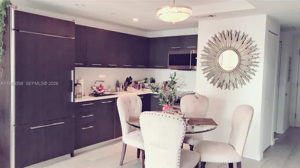 a view of a dining room with furniture