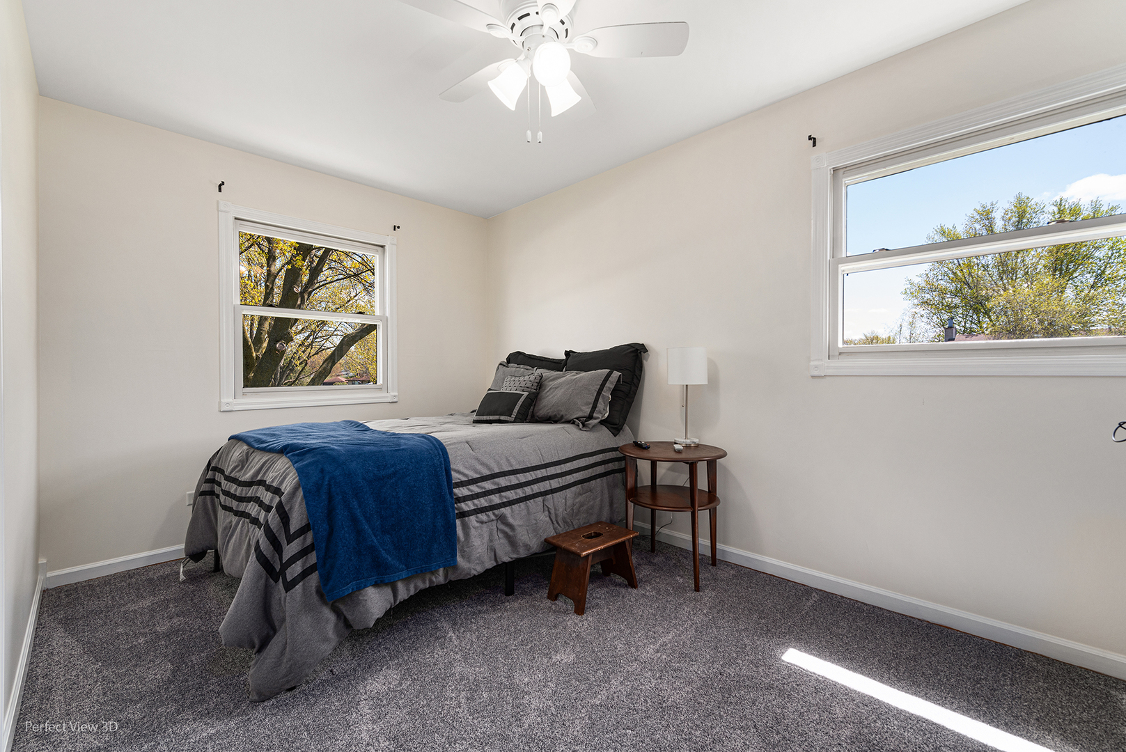 100 White Oak Drive Lindenhurst, IL 60046 - Photo 12 of 22 a bedroom with a bed and a window