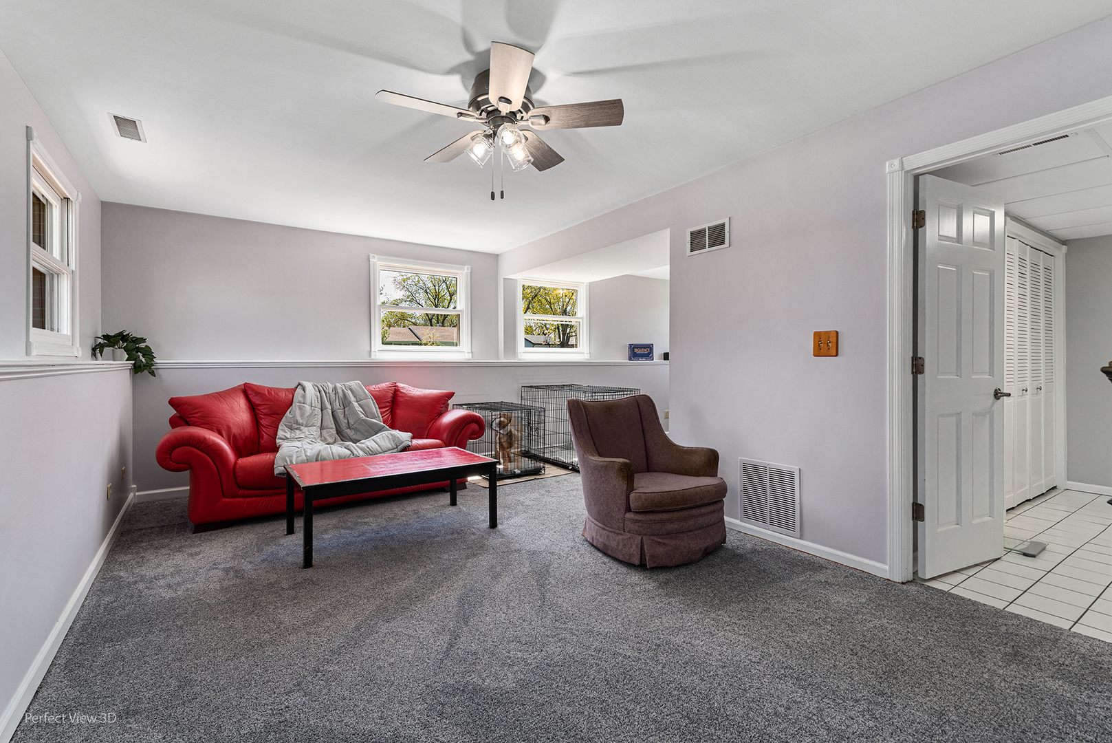 100 White Oak Drive Lindenhurst, IL 60046 - Photo 15 of 22 a living room with furniture and a ceiling fan