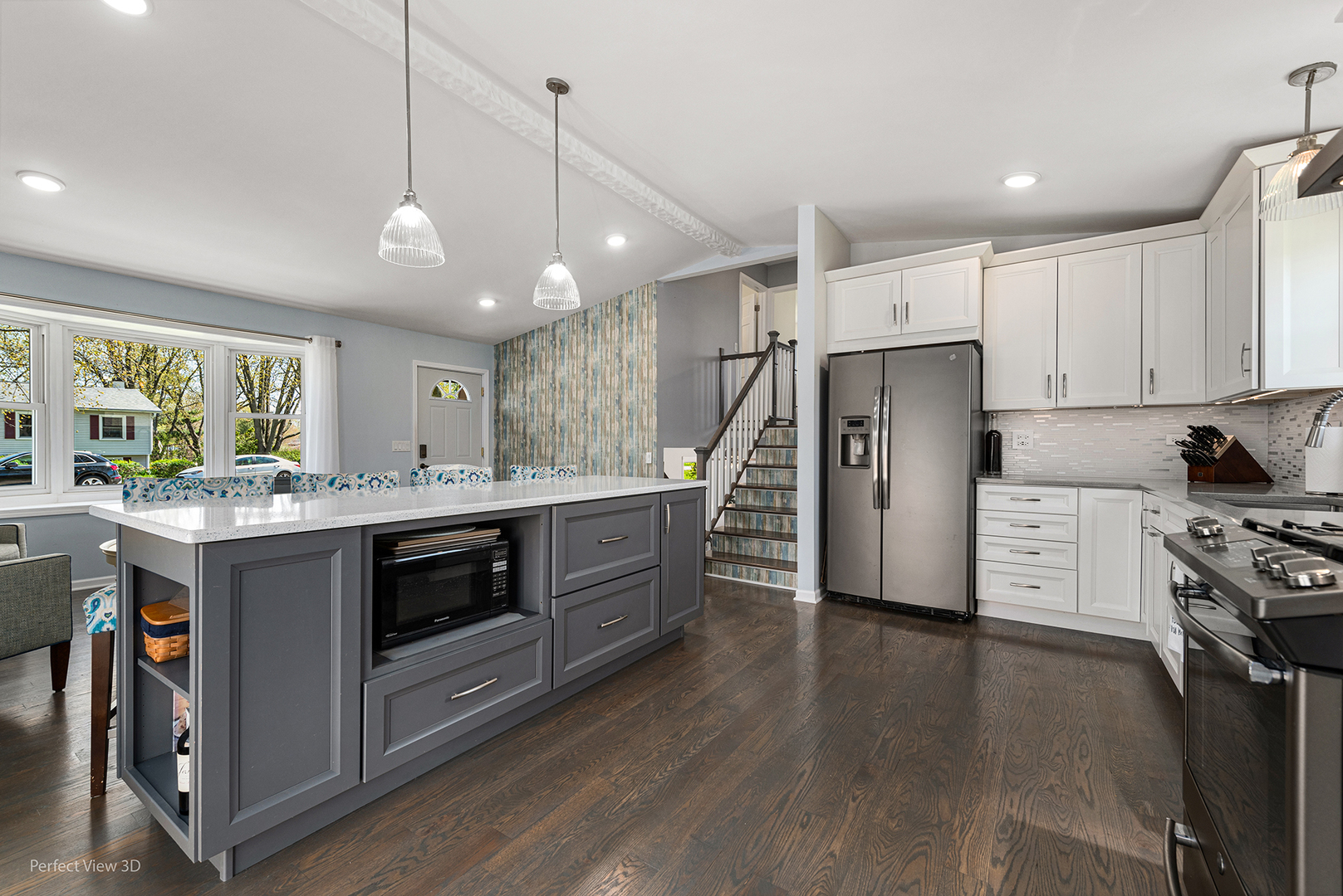100 White Oak Drive Lindenhurst, IL 60046 - Photo 6 of 22 a kitchen with stainless steel appliances granite countertop a stove and a refrigerator