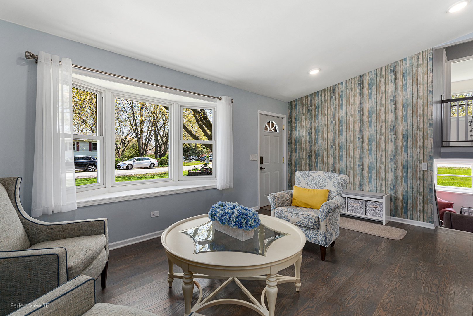 100 White Oak Drive Lindenhurst, IL 60046 - Photo 8 of 22 a living room with furniture and a large window