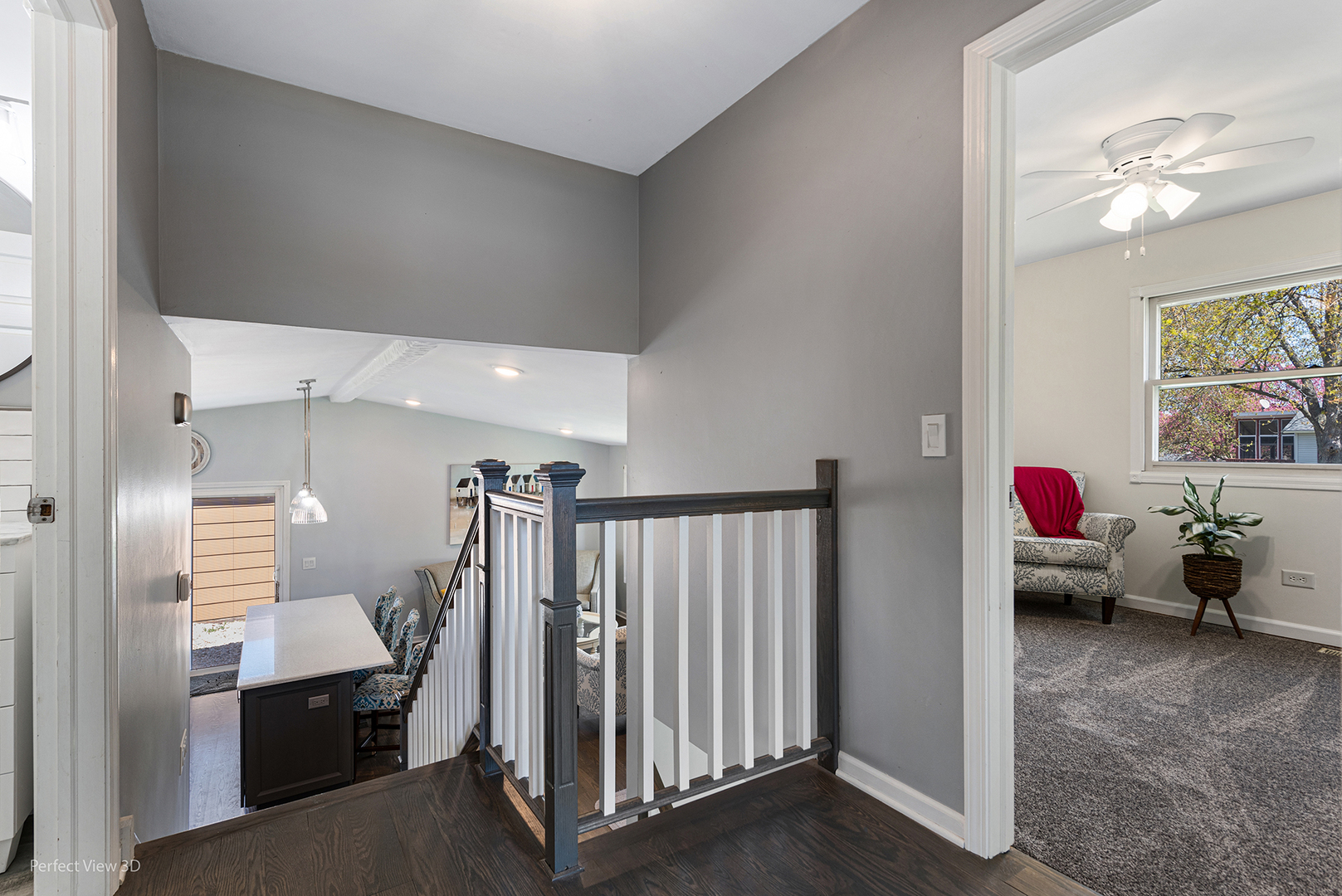 100 White Oak Drive Lindenhurst, IL 60046 - Photo 9 of 22 a living room with furniture and a chandelier