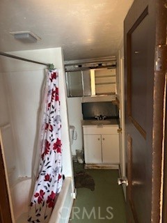 3392 Grey Clearlake, CA 95422 - Photo 6 of 11 a bathroom with a window and a shower curtain