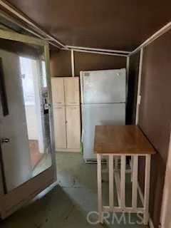 a bathroom with a shower and a mirror