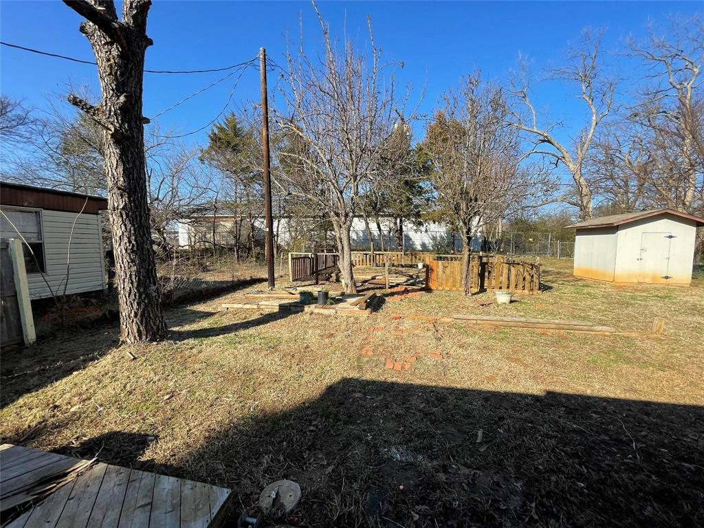 117 East Prospect Street Denison, TX 75021 - Photo 13 of 13 a view of yard with tree