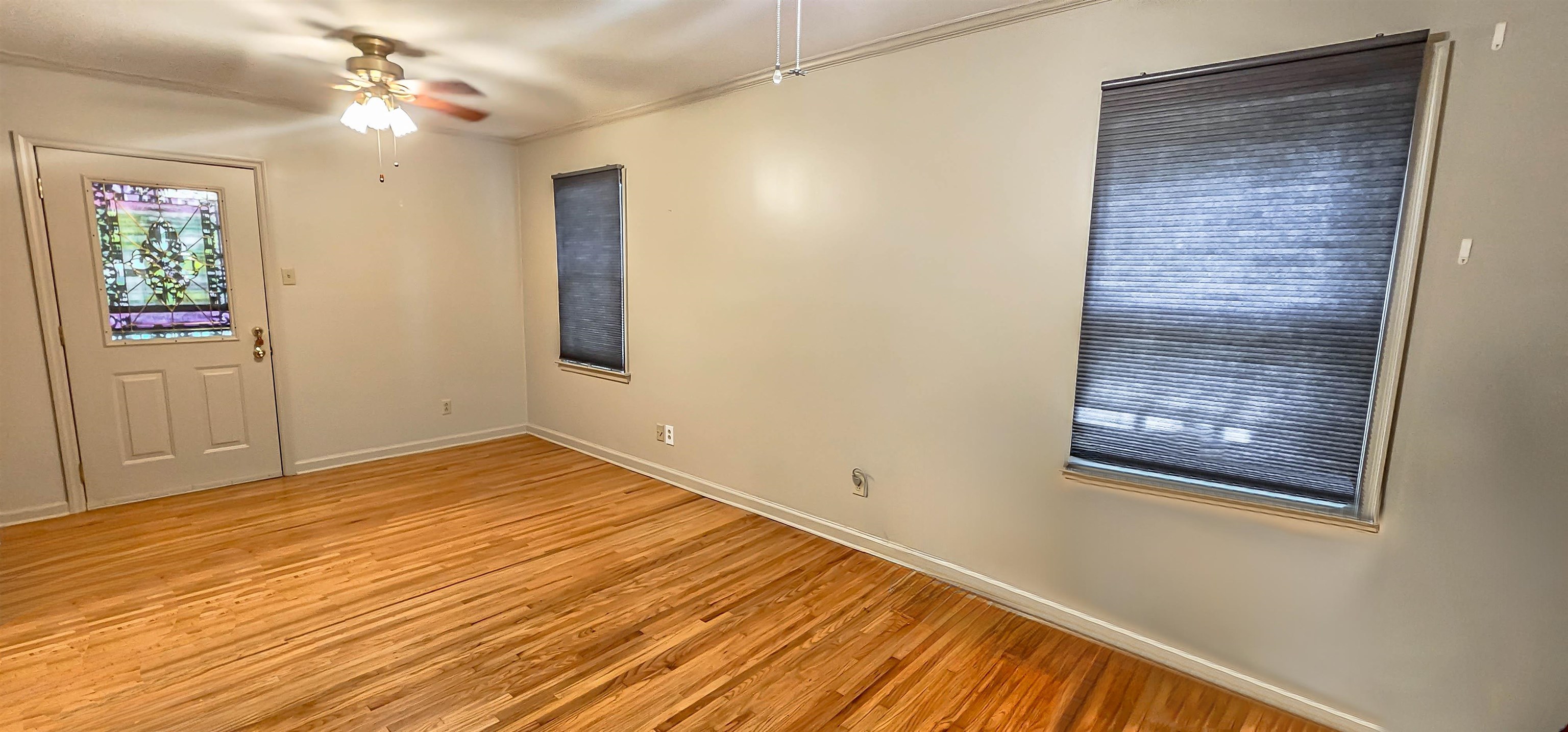 5246 Quince Road Memphis, TN 38117 - Photo 19 of 28 wooden floor in an empty room with a window
