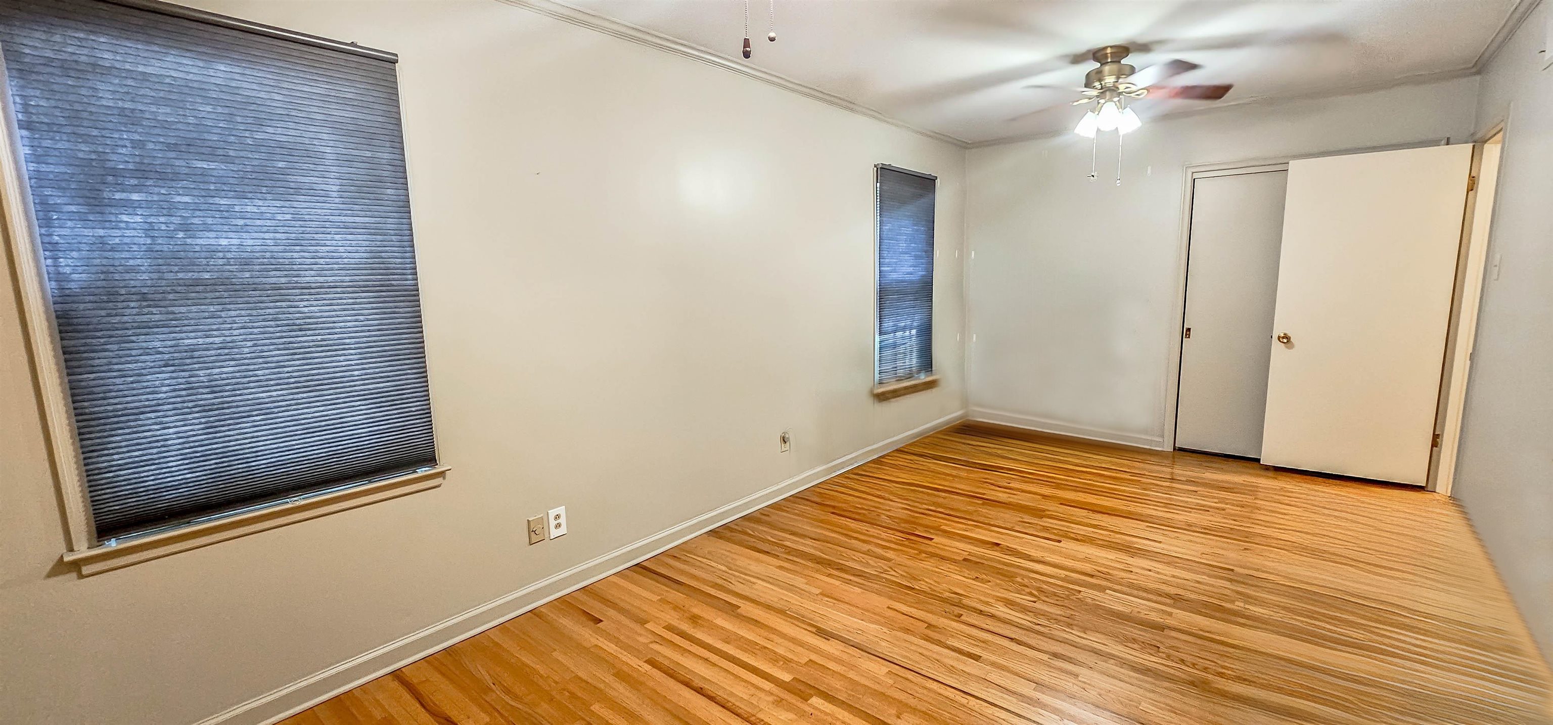 5246 Quince Road Memphis, TN 38117 - Photo 20 of 28 a view of empty room with wooden floor