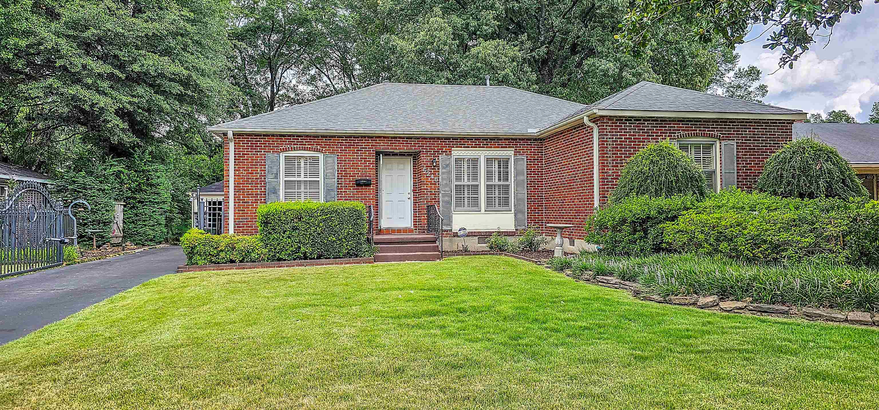 5246 Quince Road Memphis, TN 38117 - Photo 2 of 28 a view of a house with a yard