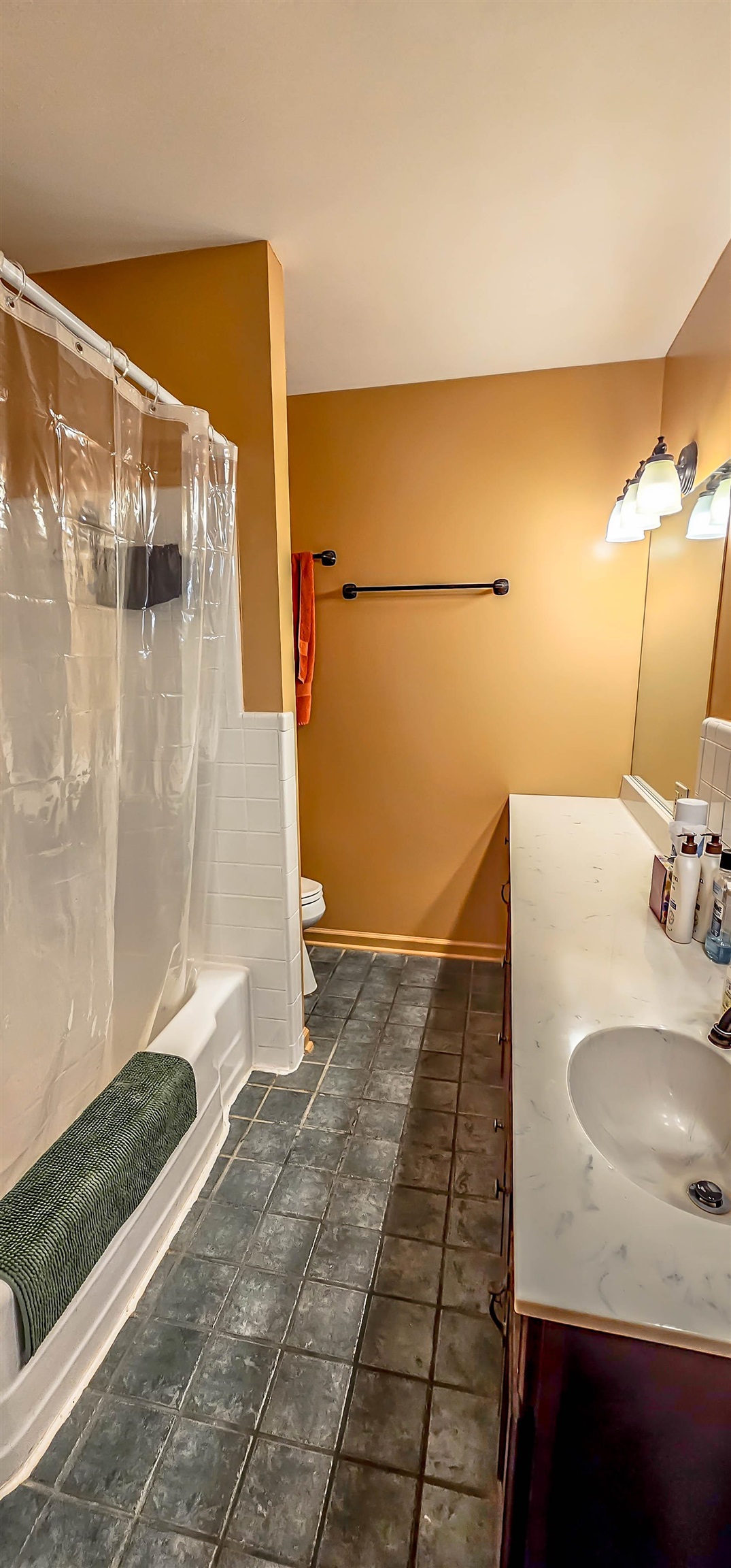 5246 Quince Road Memphis, TN 38117 - Photo 21 of 28 a bathroom with a sink and a mirror
