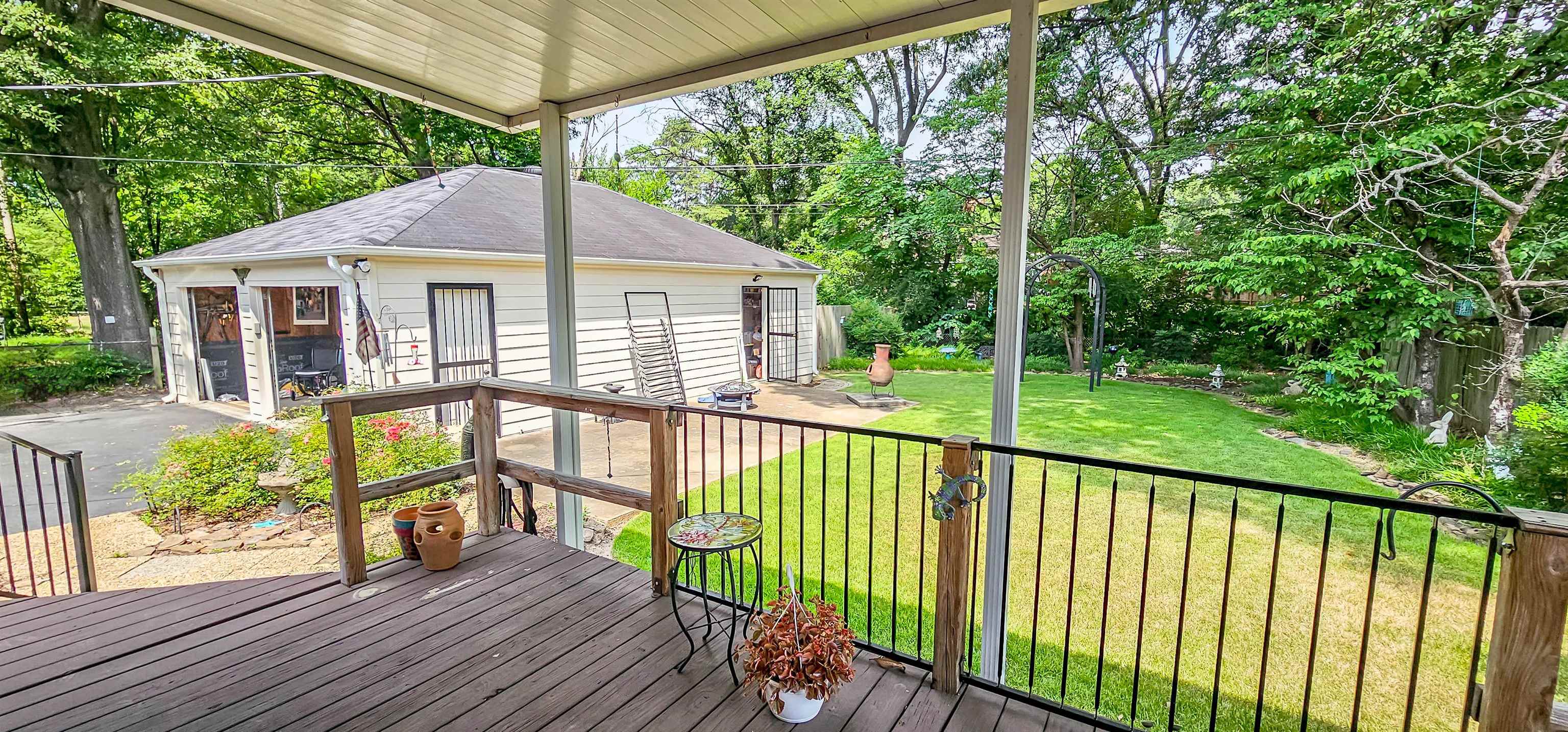 5246 Quince Road Memphis, TN 38117 - Photo 25 of 28 a view of a wooden deck and a yard with lake view
